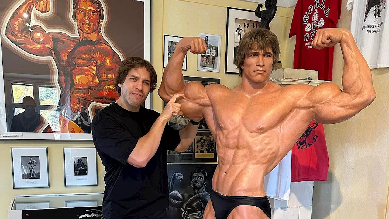 Joseph Baena Poses Up With Dad Arnold Schwarzenegger S Muscly Waxwork