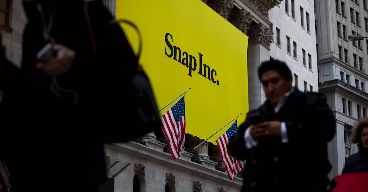 Stocks making the biggest moves midday: Snap, Boston Beer, Duluth Holdings & more