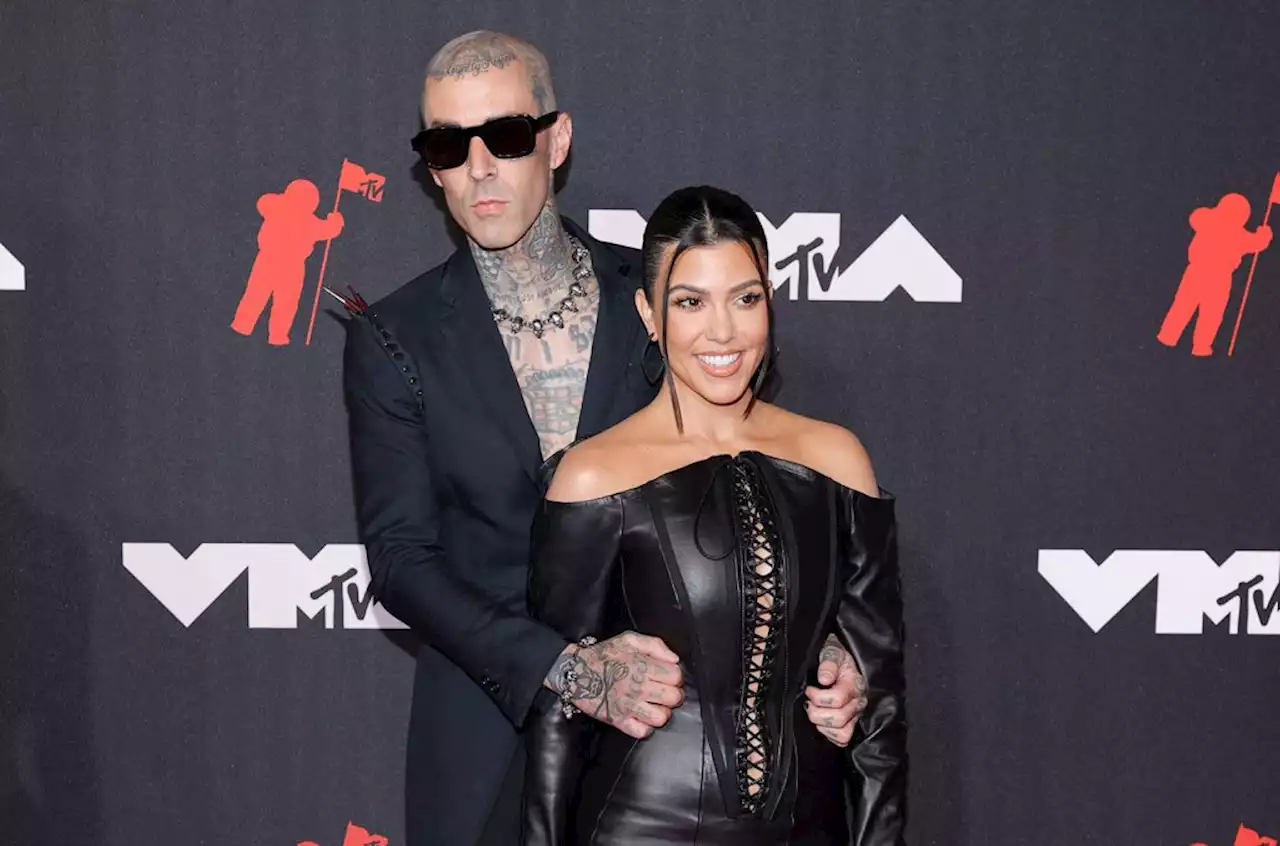 Travis Barker & Kourtney Kardashian Join Families for a Festive Christmas Eve Celebration