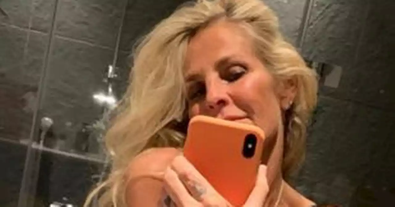 Ulrika Jonsson shows off abs and tattoos in drunken mirror snap