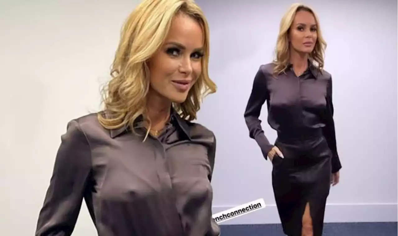 Amanda Holden, 50, risks revealing too much in blouse as she flaunts sensational curves