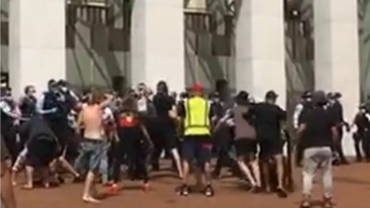 Police and protesters clash outside Parliament House