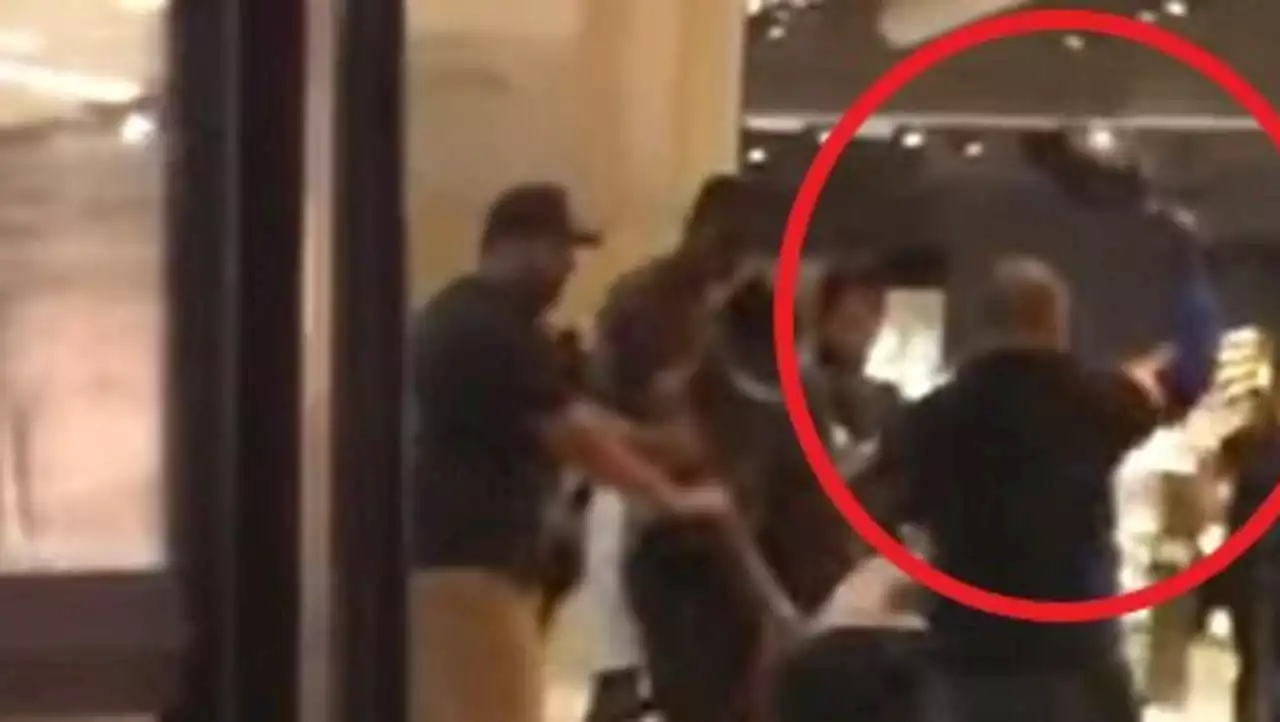 Moment man wields frying pan in shop brawl