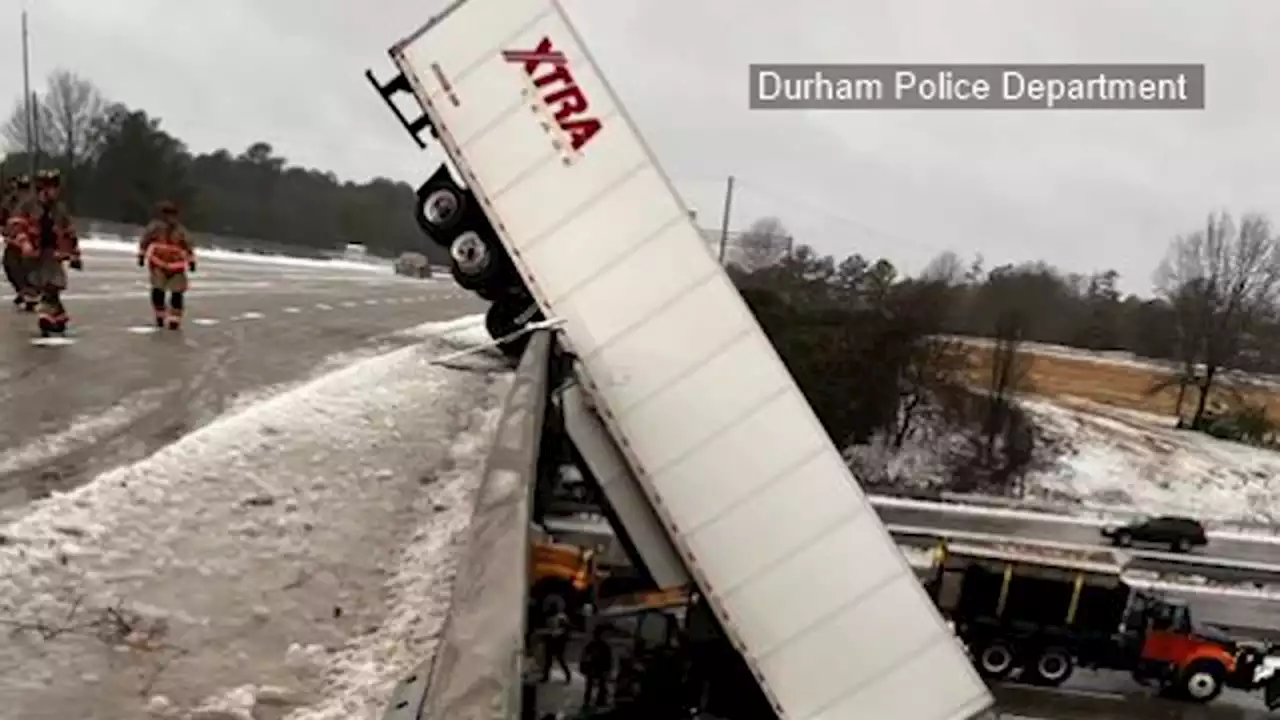 Durham accident: Semitrailer falls off North Carolina overpass during winter weather; driver injured