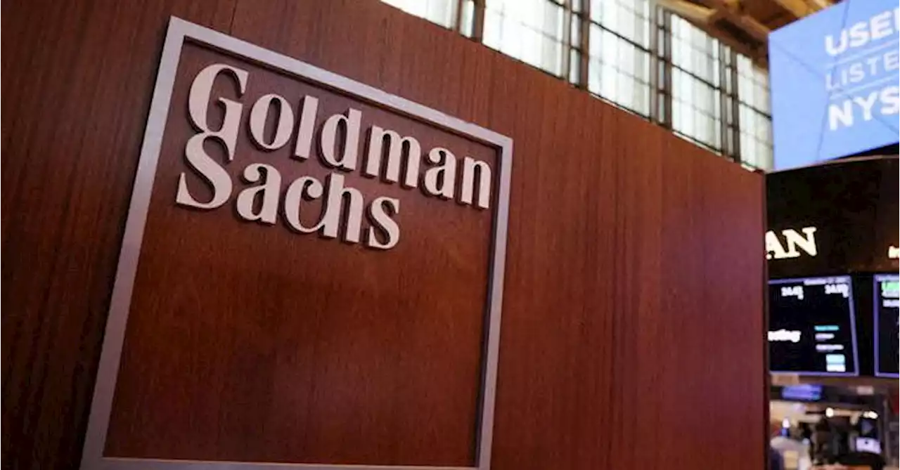 Goldman shares tumble as weak trading, higher pay hit profit