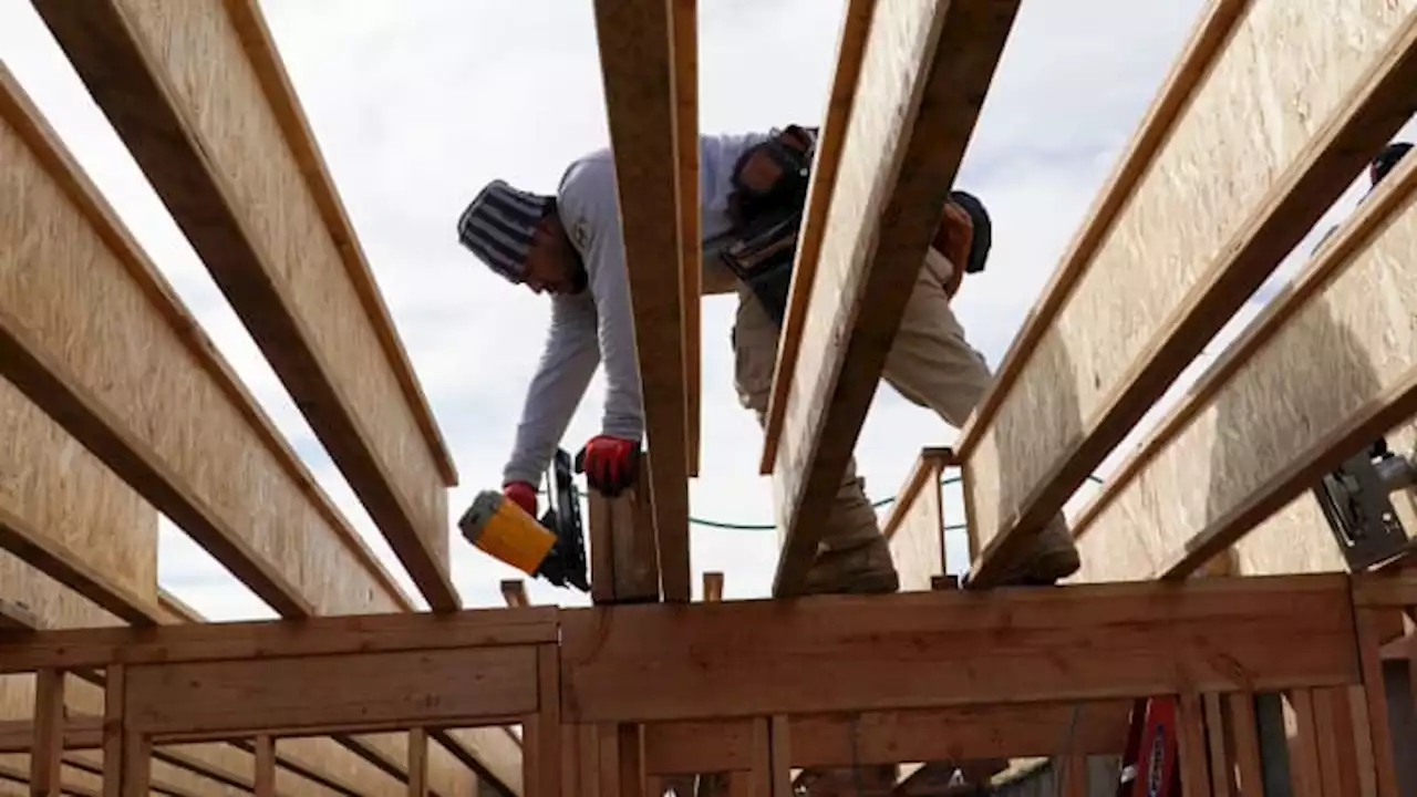 U.S. housing starts unexpectedly rise in December; building permits surge