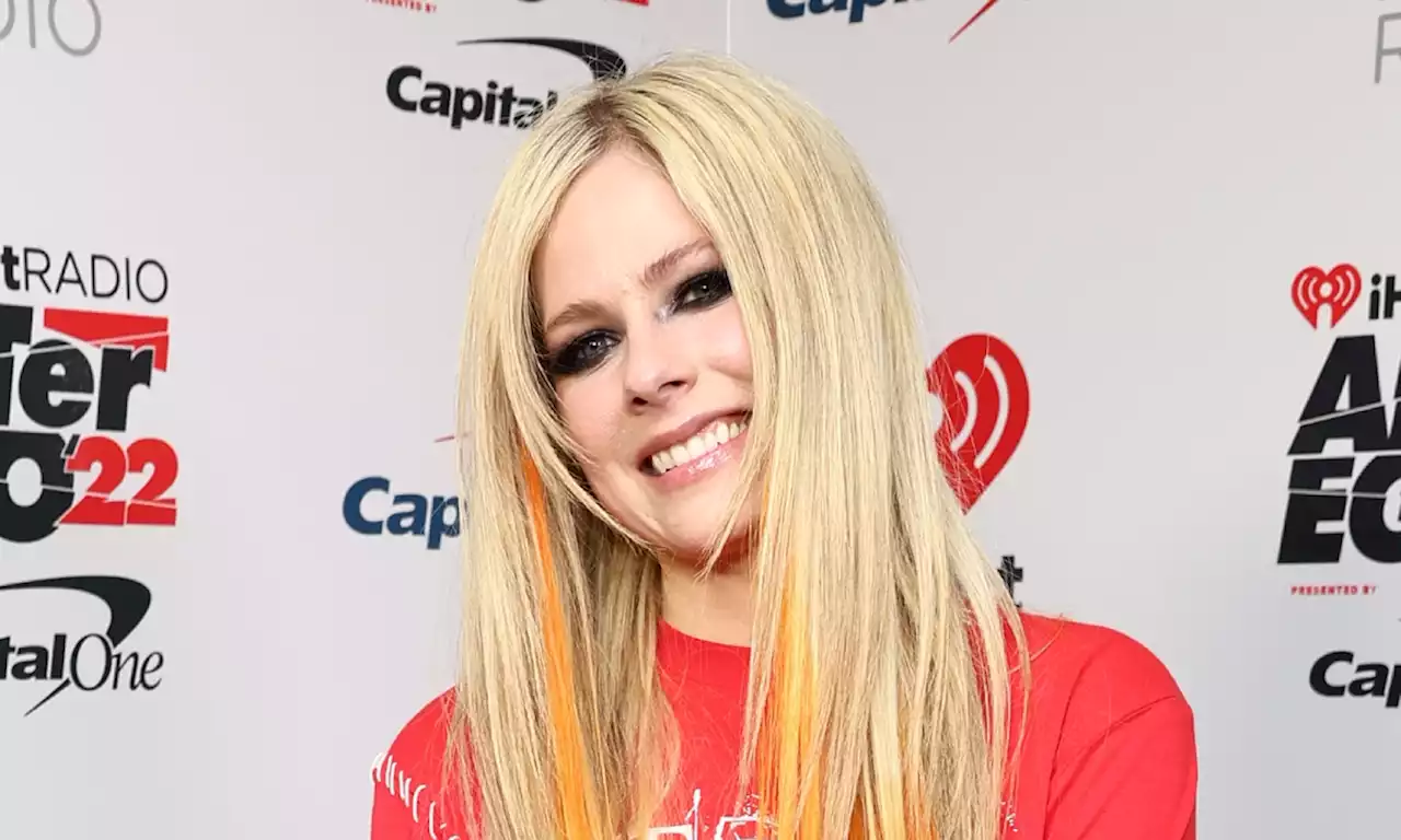 Avril Lavigne poses in fishnets for major new photos you have to see