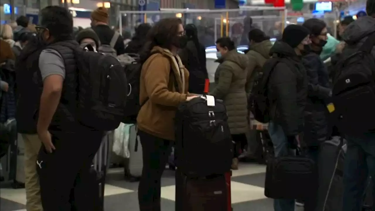 O'Hare flight cancelations, delays; travelers face both snowstorm and COVID-related crew shortages