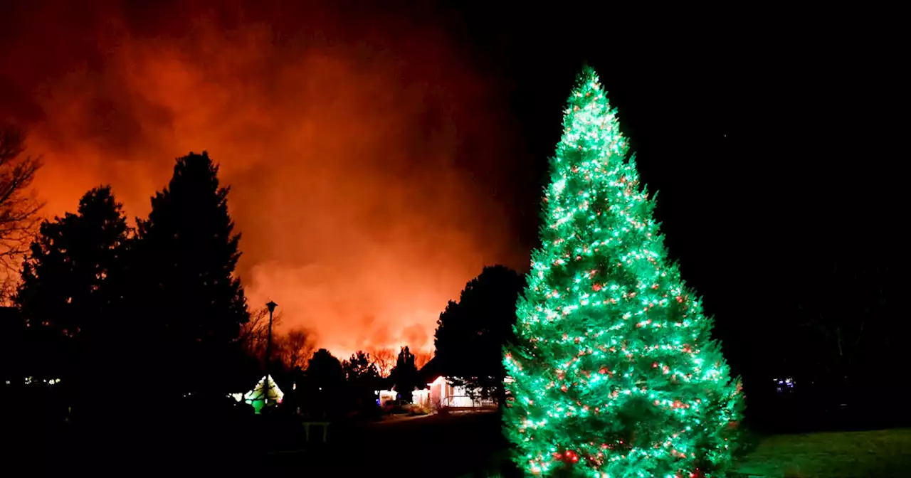 Tens of thousands evacuated, hundreds of homes destroyed in late-season wind-blown wildfires outside Denver