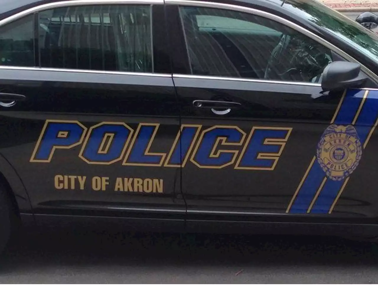 Man dies after being found in vehicle in Akron with gunshot wound