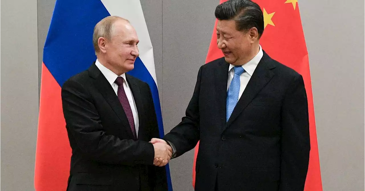 Britain warns Putin and Xi: West will stand up to 'dictatorship'