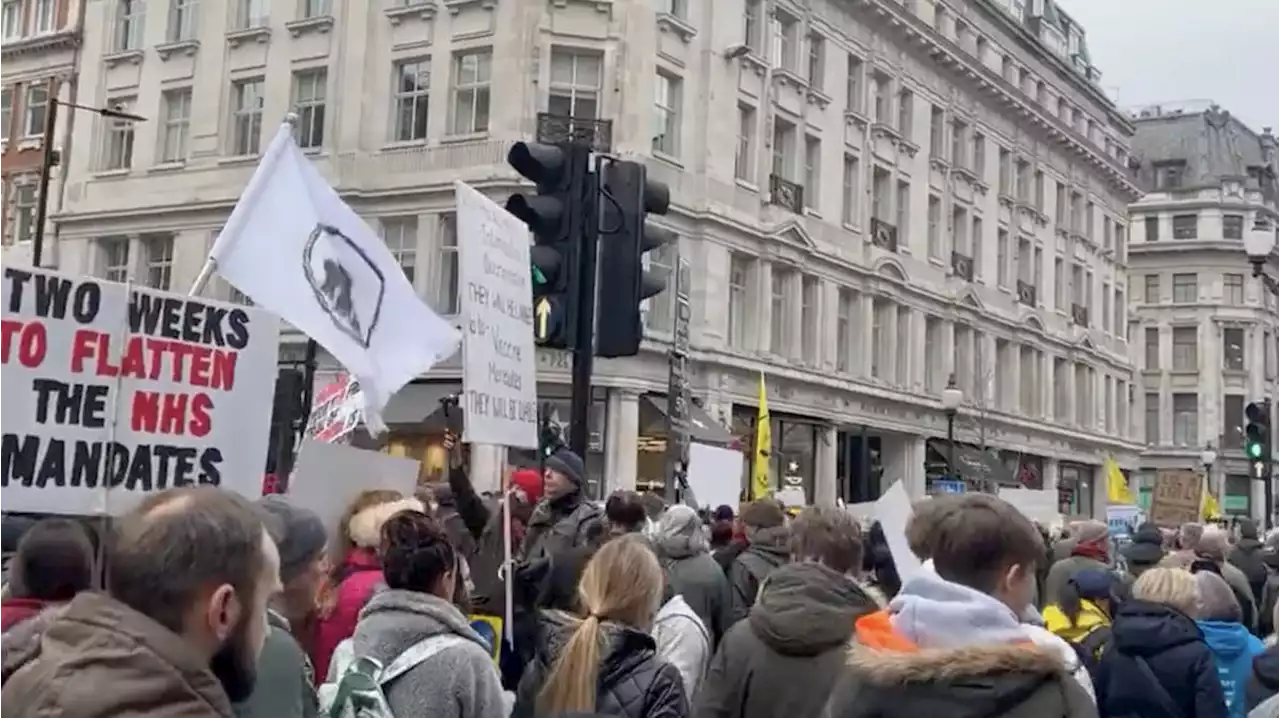 Thousands march in London to protest against mandatory jabs for unvaccinated NHS staff