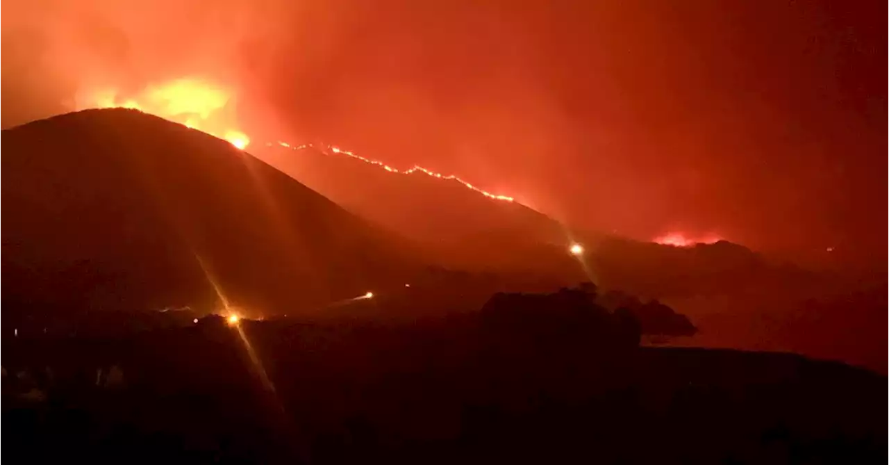 Massive California wildfire triggers evacuations, closes highway