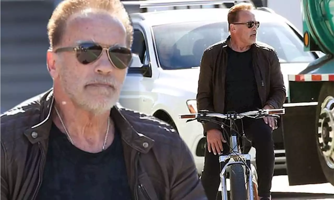 Arnold Schwarzenegger takes a bike ride after getting into a car crash