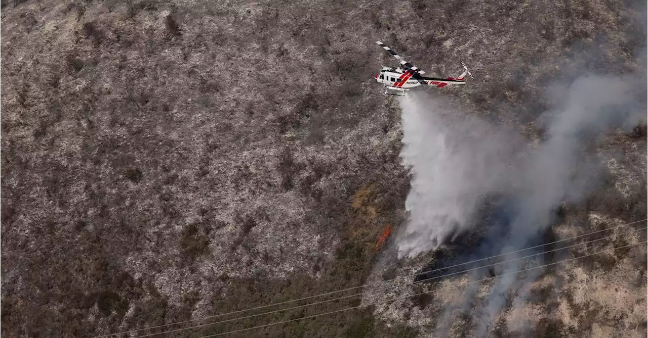 Crews make progress against California wildfire that triggered evacuations