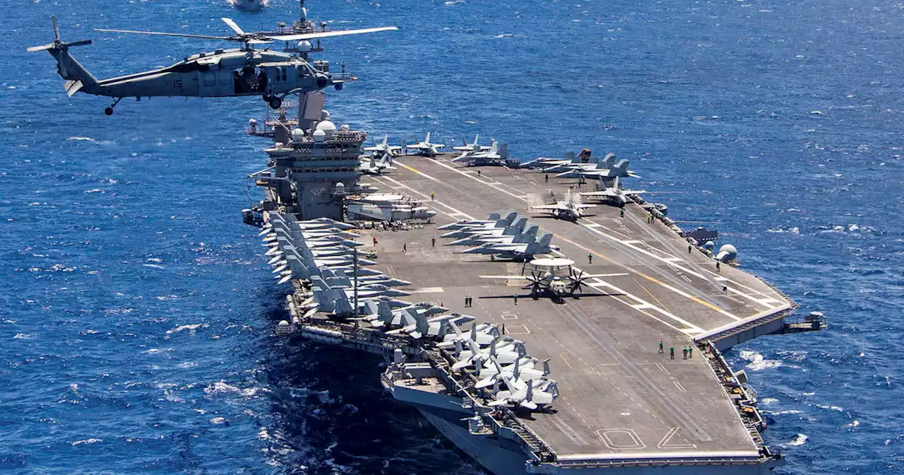 Pilot ejects before U.S. combat jet crashes into aircraft carrier in South China Sea; 7 injured