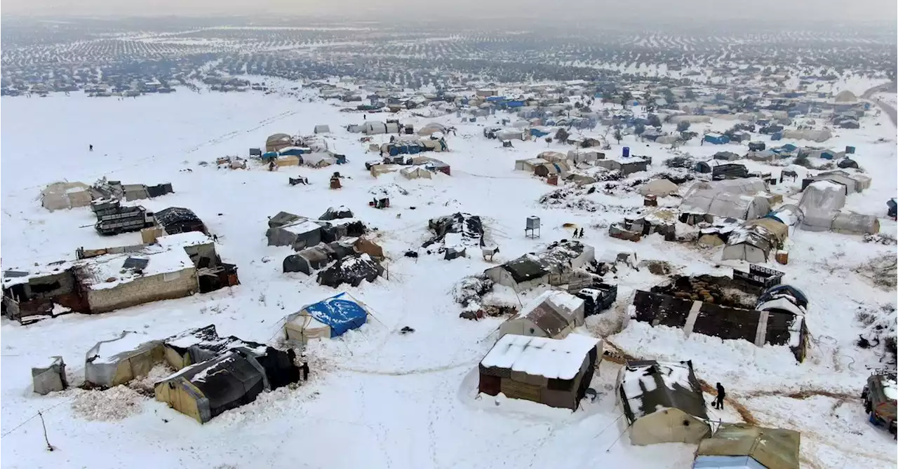 Snow storms, cold and fire threaten displaced Syrians in northern camps