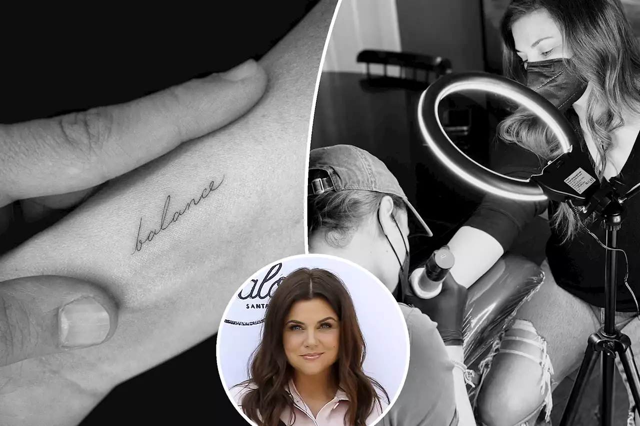 Tiffani Thiessen shows off new ‘balance’ tattoo