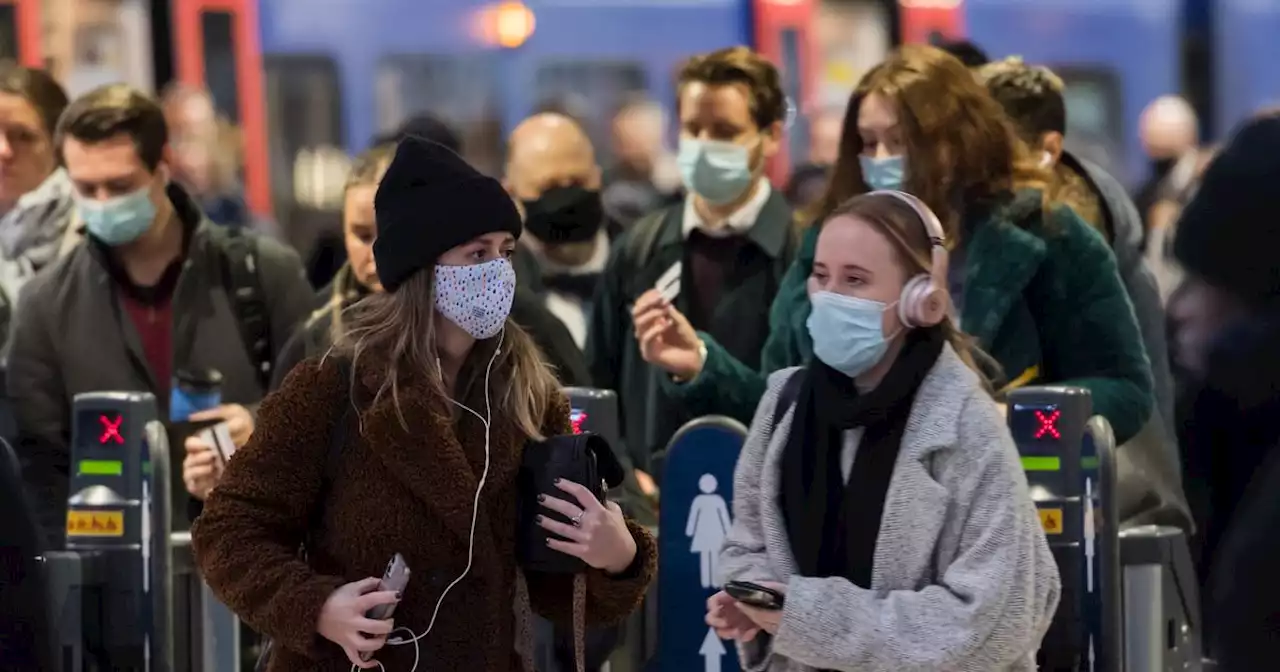 Millions of Brits are happy to 'live with' Covid and continue to wear face masks