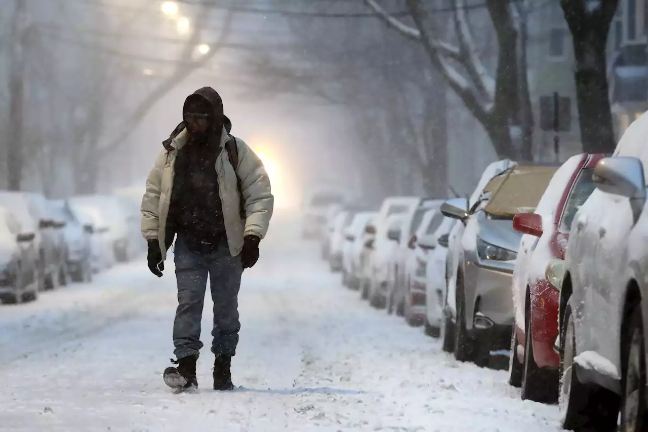 Winter storm churns up East Coast with deep snow, high winds