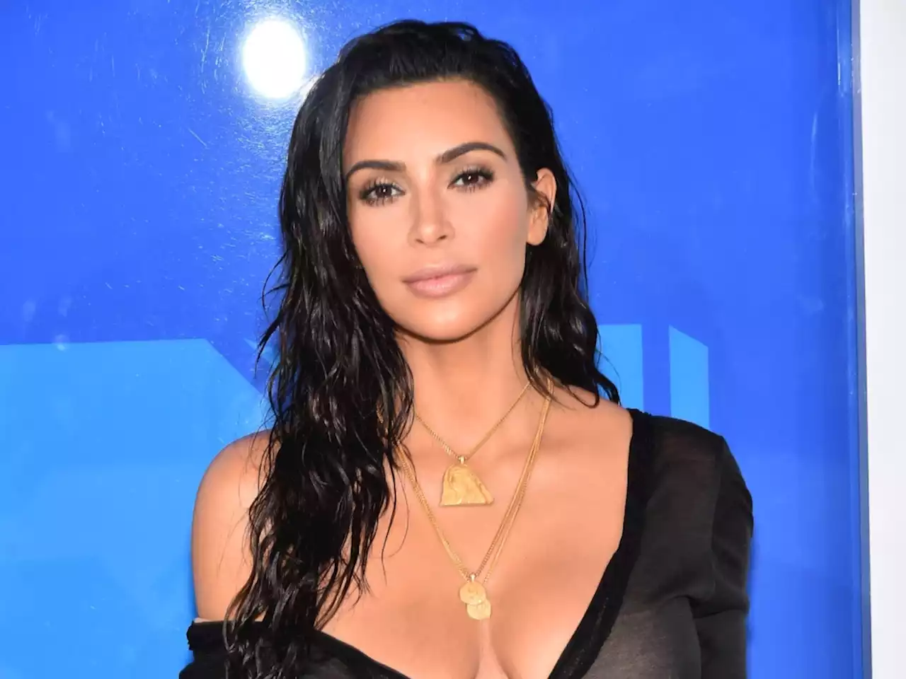 Kim Kardashian Is Perpetually on Vacation With These Show-Stopping & Oiled-Up Bikini Snapshots