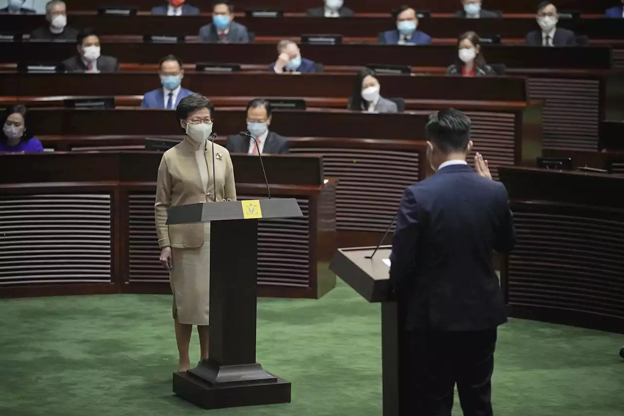 Hong Kong news site shuts as pro-Beijing lawmakers sworn in | AP News