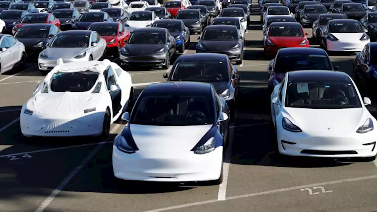 Tesla delivered 936,172 electric vehicles in 2021, with the fourth-quarter setting a new record