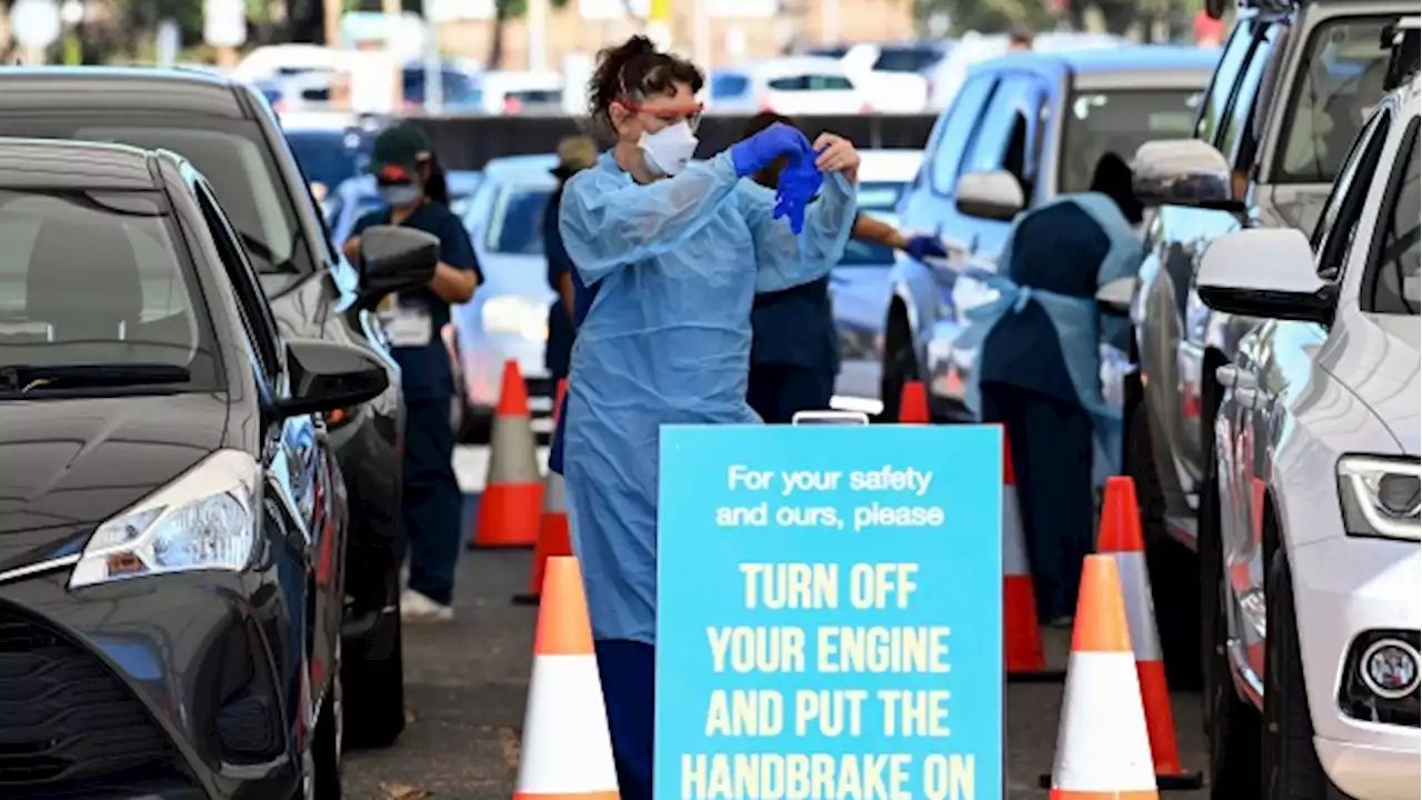 Australia to push ahead with reopening amid record COVID-19 cases