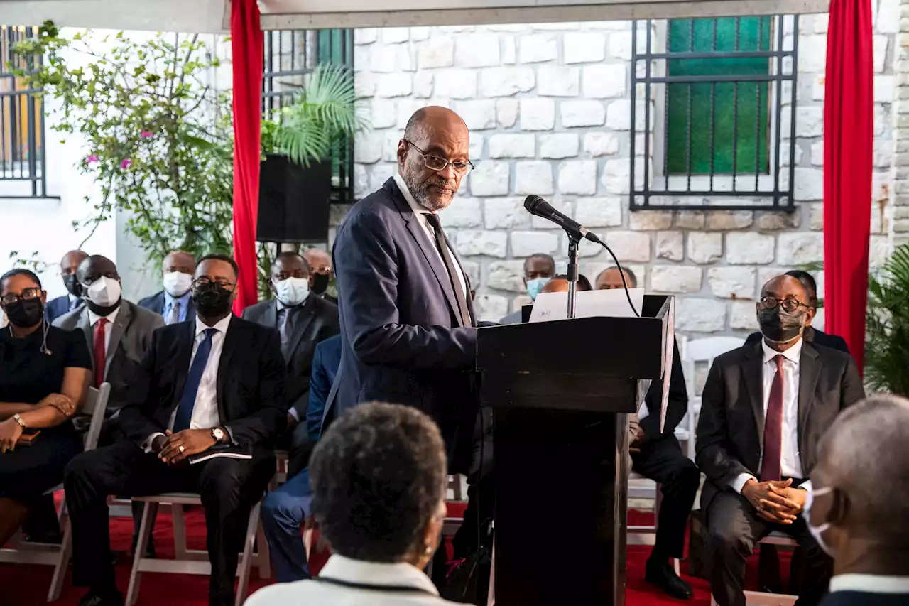 Haiti's Prime Minister Ariel Henry flees shootout between his security team, armed group