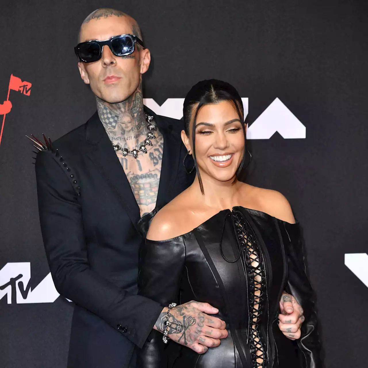 Kourtney Kardashian and Travis Barker Say They 'Would Die' for Each Other - E! Online