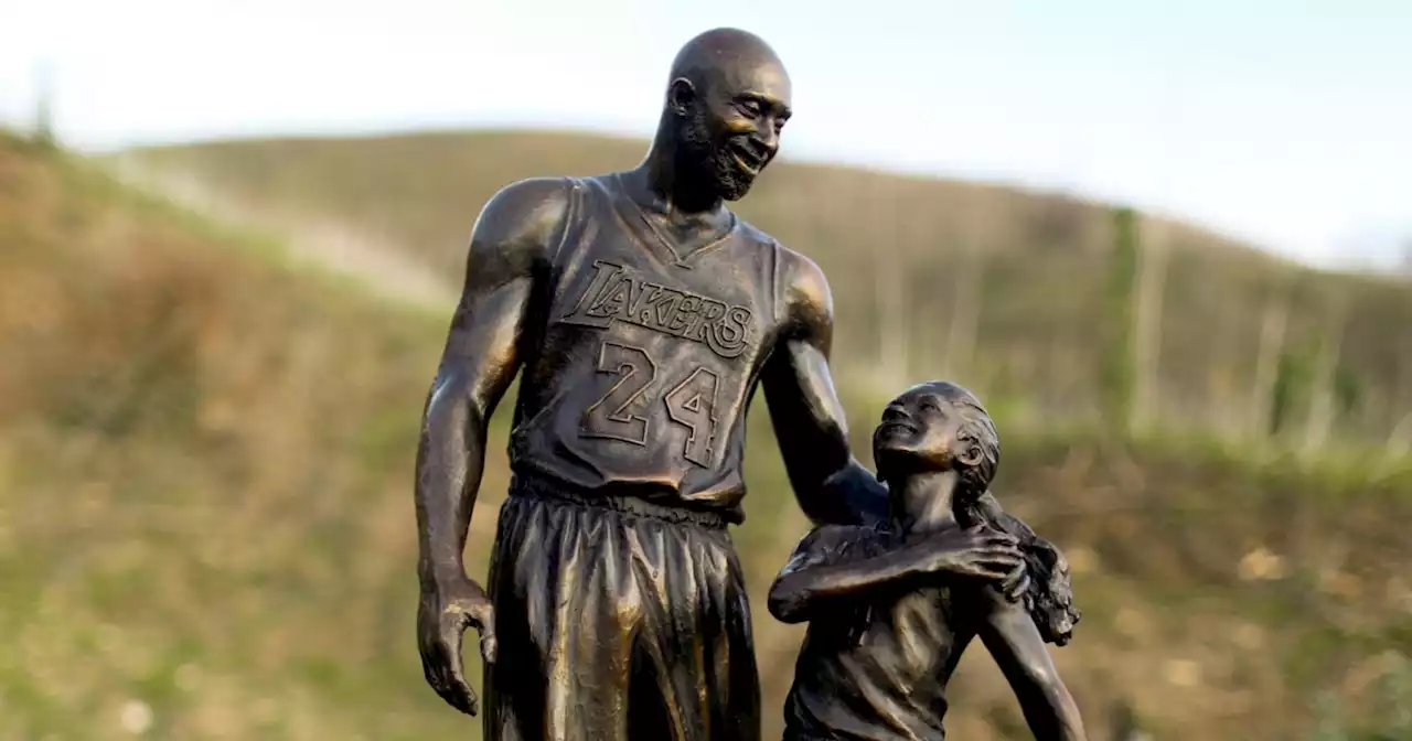 Statue of Kobe and Gigi Bryant placed at crash site on anniversary