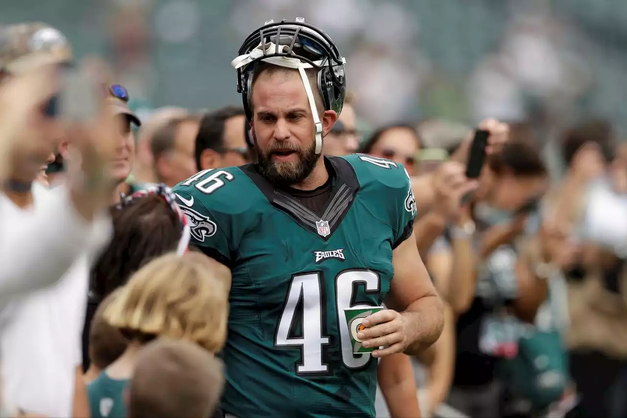 Former Eagles long snapper Jon Dorenbos helps save restaurant owner in fiery accident