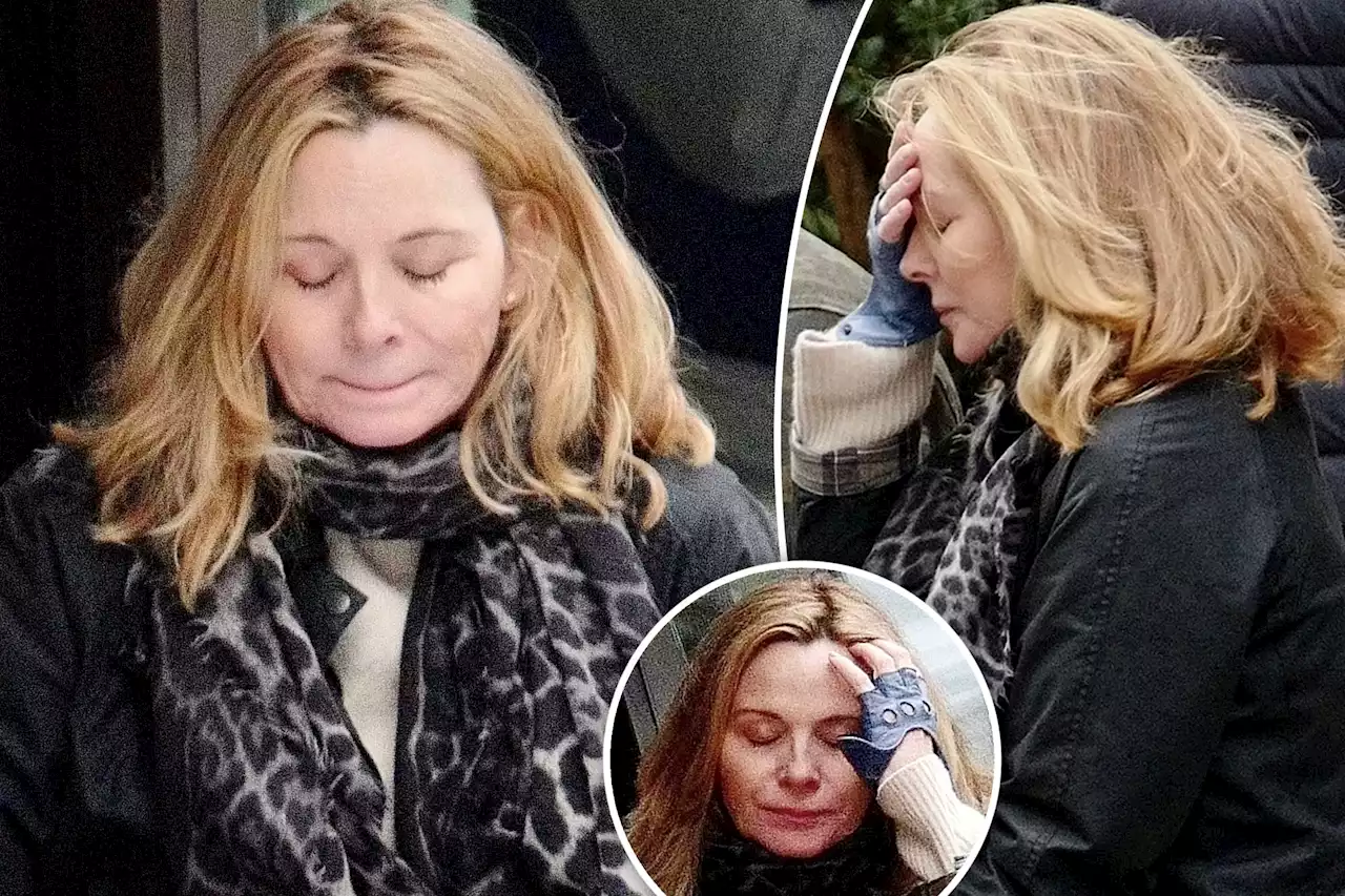 Kim Cattrall appears solemn in rare London sighting