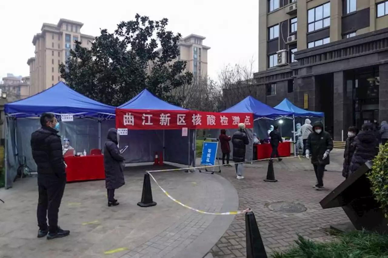 China's Xi'an vows strict implementation of Covid-19 curbs even as cases decline