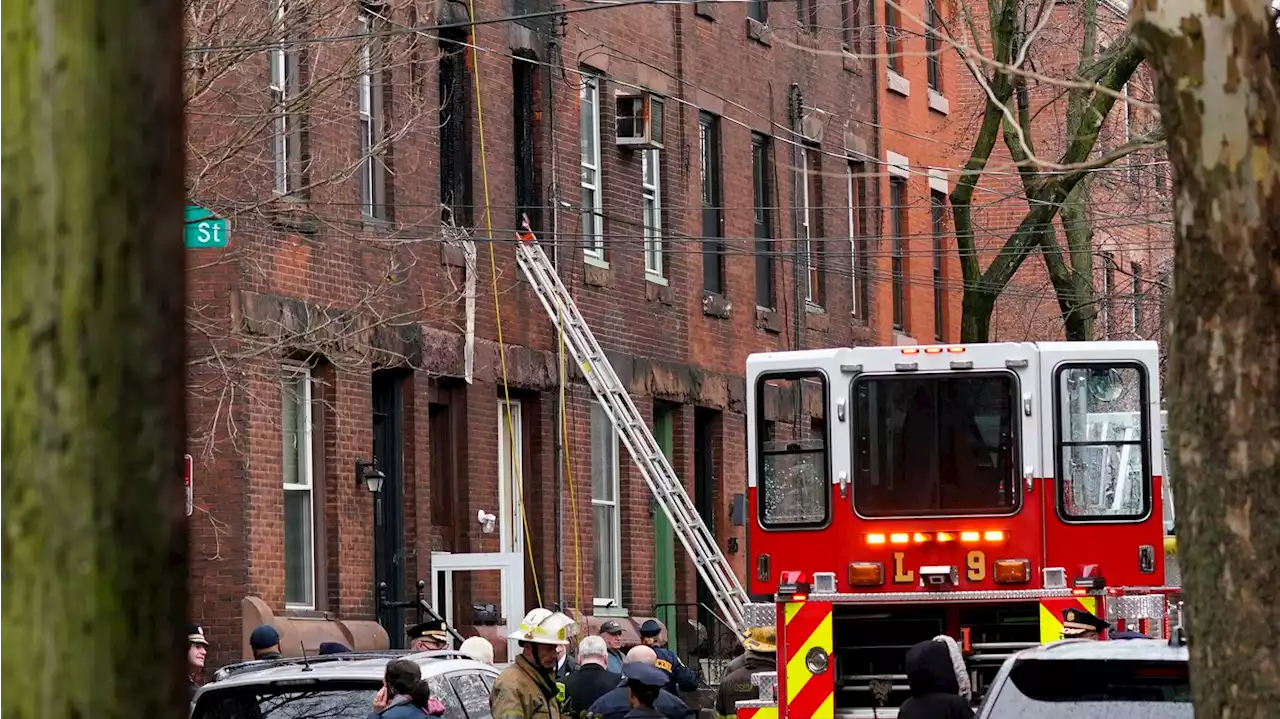 Philadelphia row house fire kills at least 13, including 7 kids