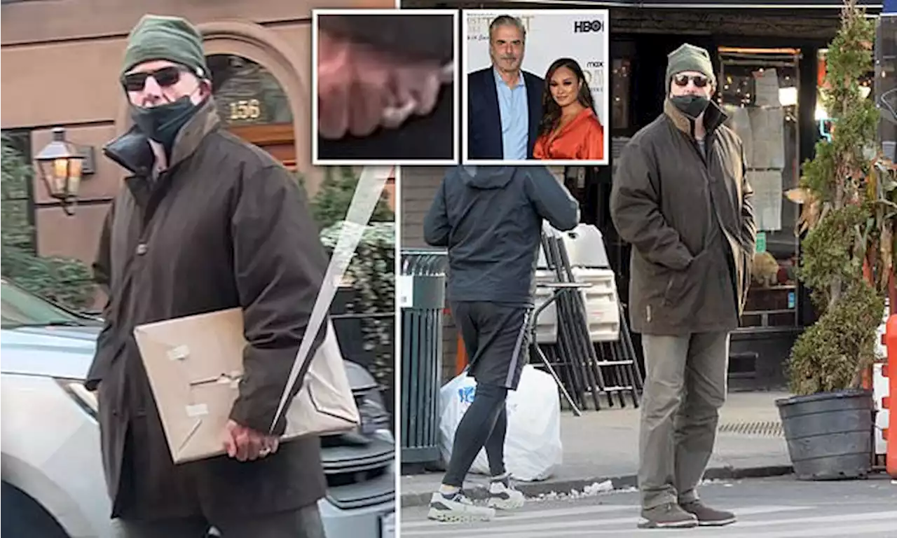 SATC star Chris Noth is pictured wearing his wedding ring in NYC