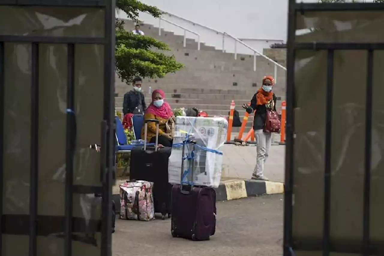 Berbagai Negara Memperpendek Masa Karantina di Tengah Lonjakan Kasus Omicron - Berita Utama - koran.tempo.co