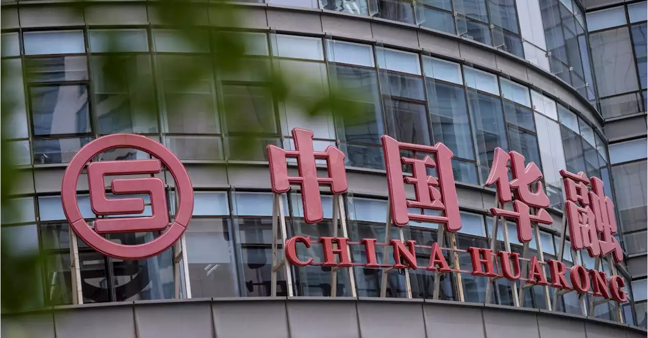 China Huarong halves in value as trading resumes