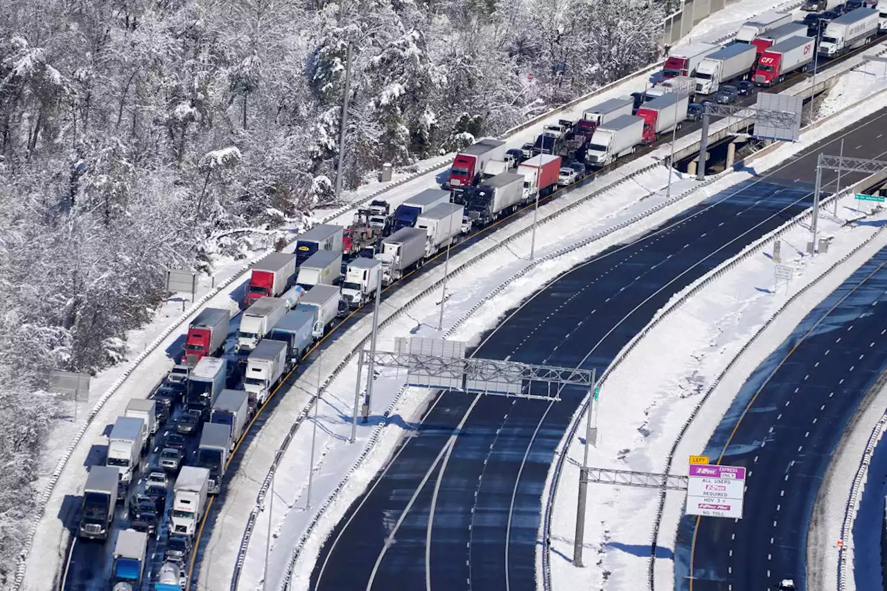 Virginia officials say they were overwhelmed by snowstorm that left thousands stranded