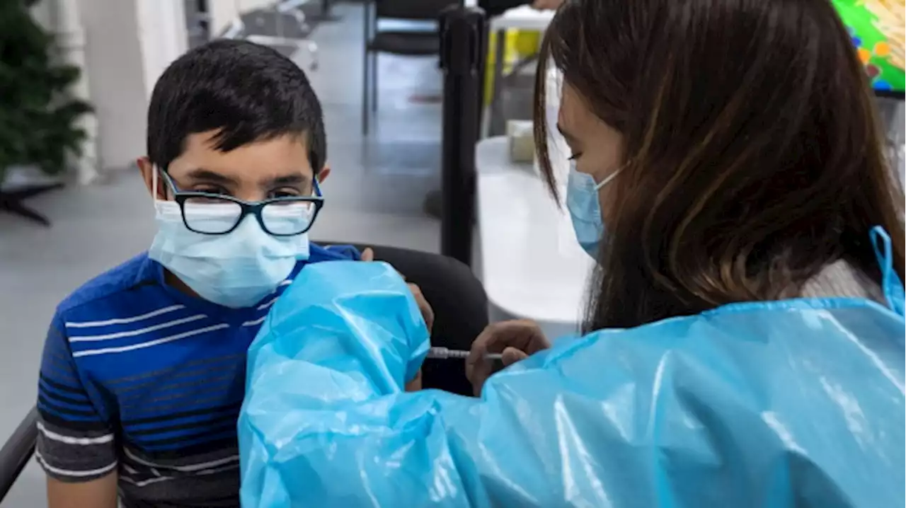 Some kids should get shorter vaccine interval amid Omicron risk, experts say