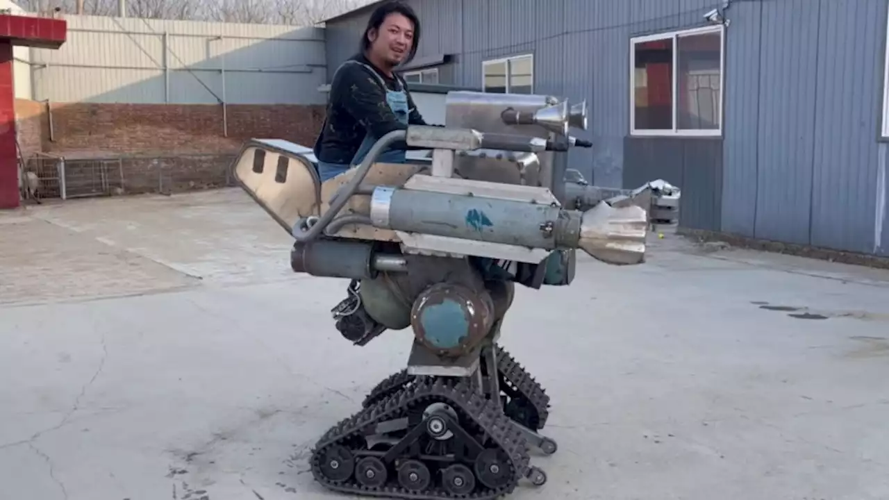 A Quirky Welder Built a Security Patrol Robot with Fists Using Scrap Metal