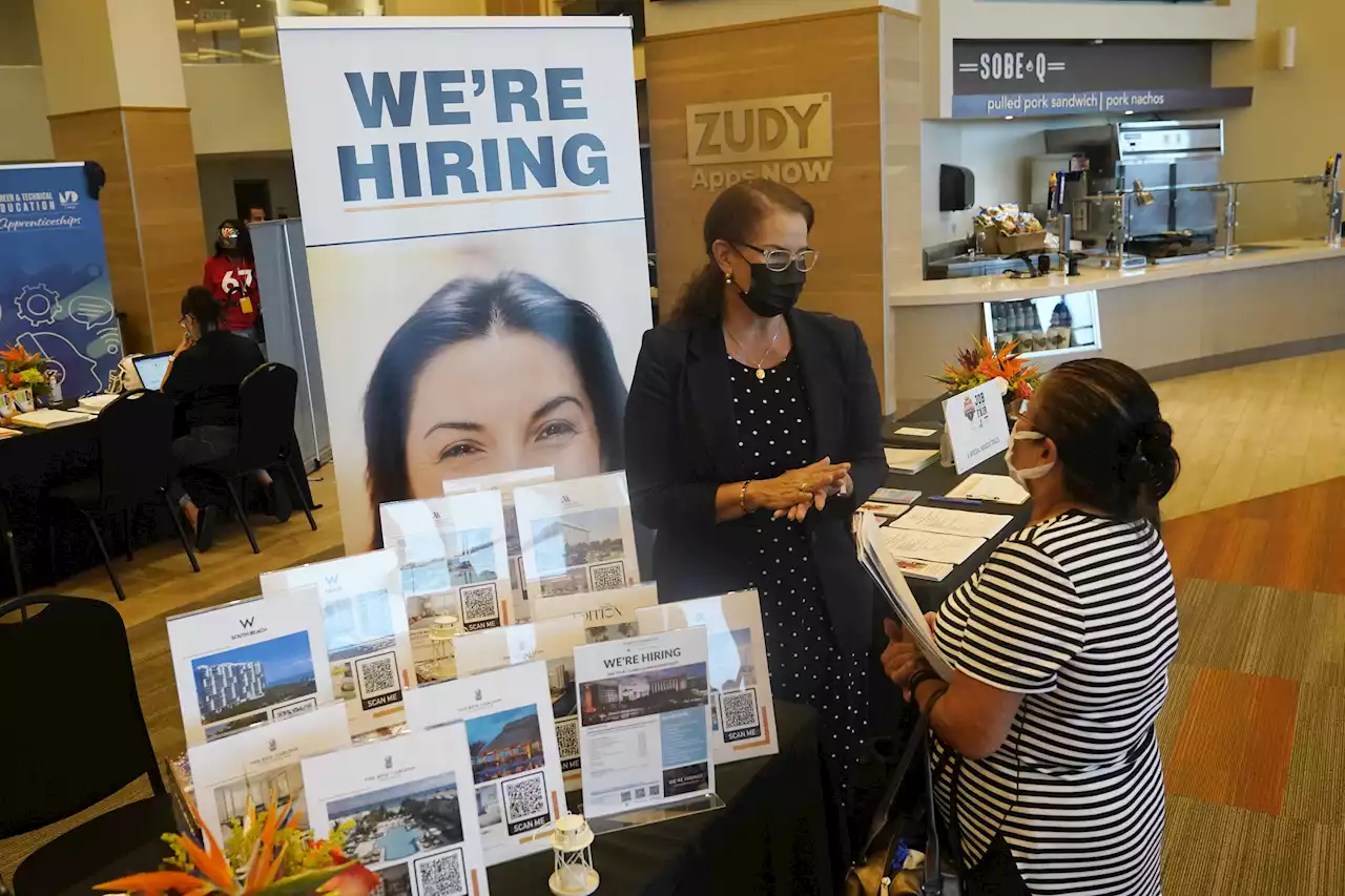 US employers add 199,000 jobs as unemployment falls to 3.9% | AP News