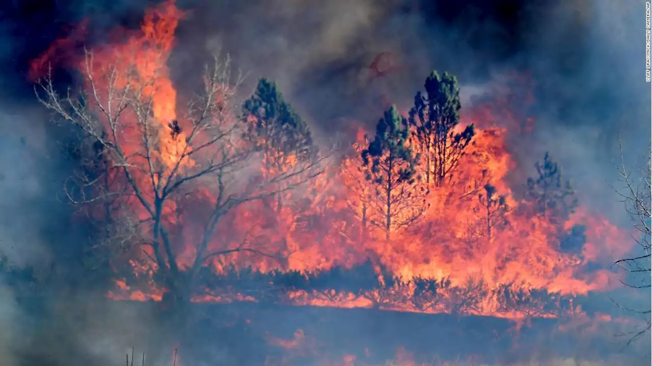 Biden promises the federal government will stick by communities devastated by Colorado wildfire