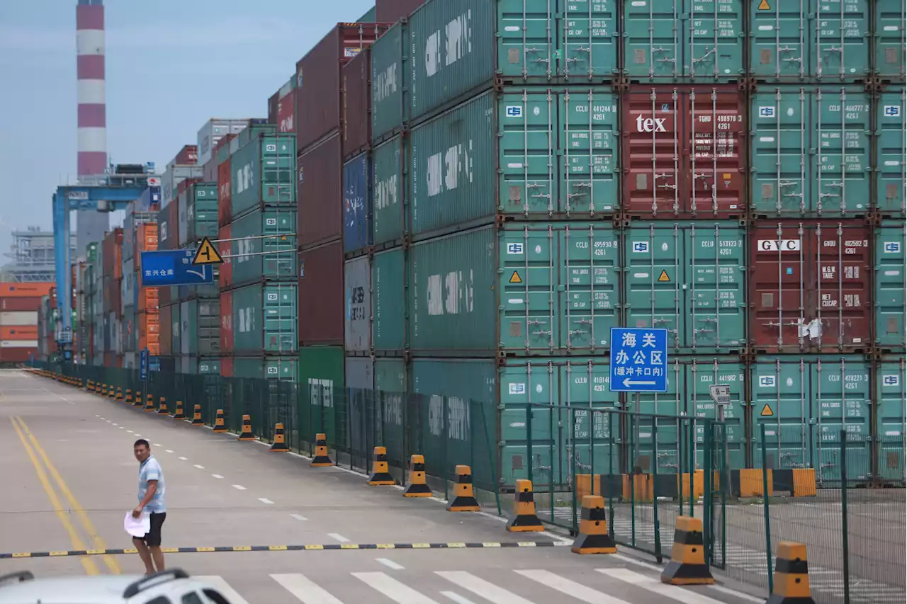 China locks down city containing one of world's busiest ports, could impact supply chain