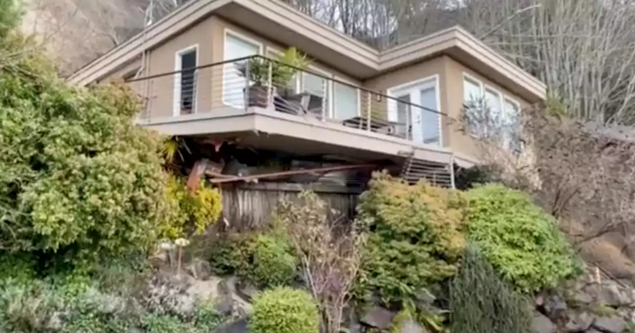 Seattle house slides off its foundation as Washington faces widespread flooding