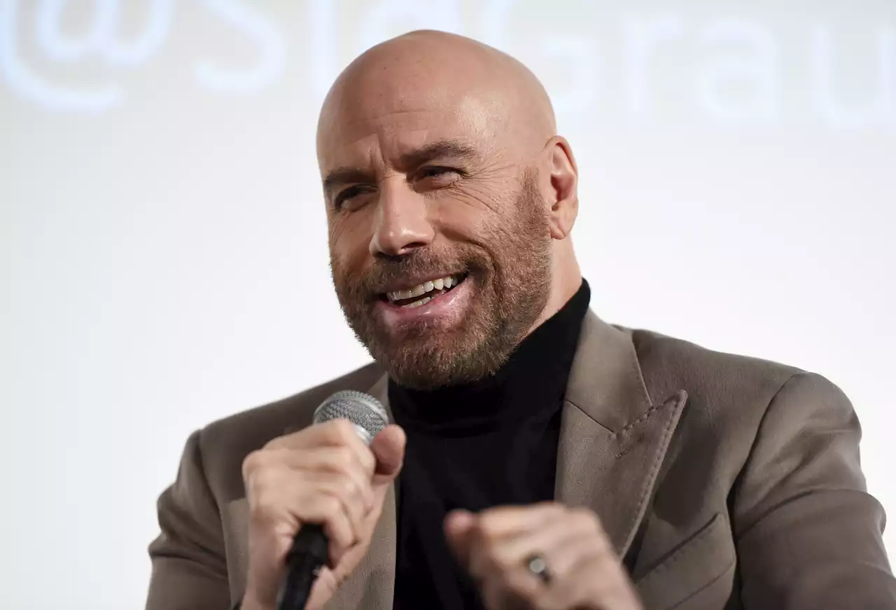 John Travolta Makes Sweet Cameo Appearance in Daughter Ella's 'Dizzy' Video