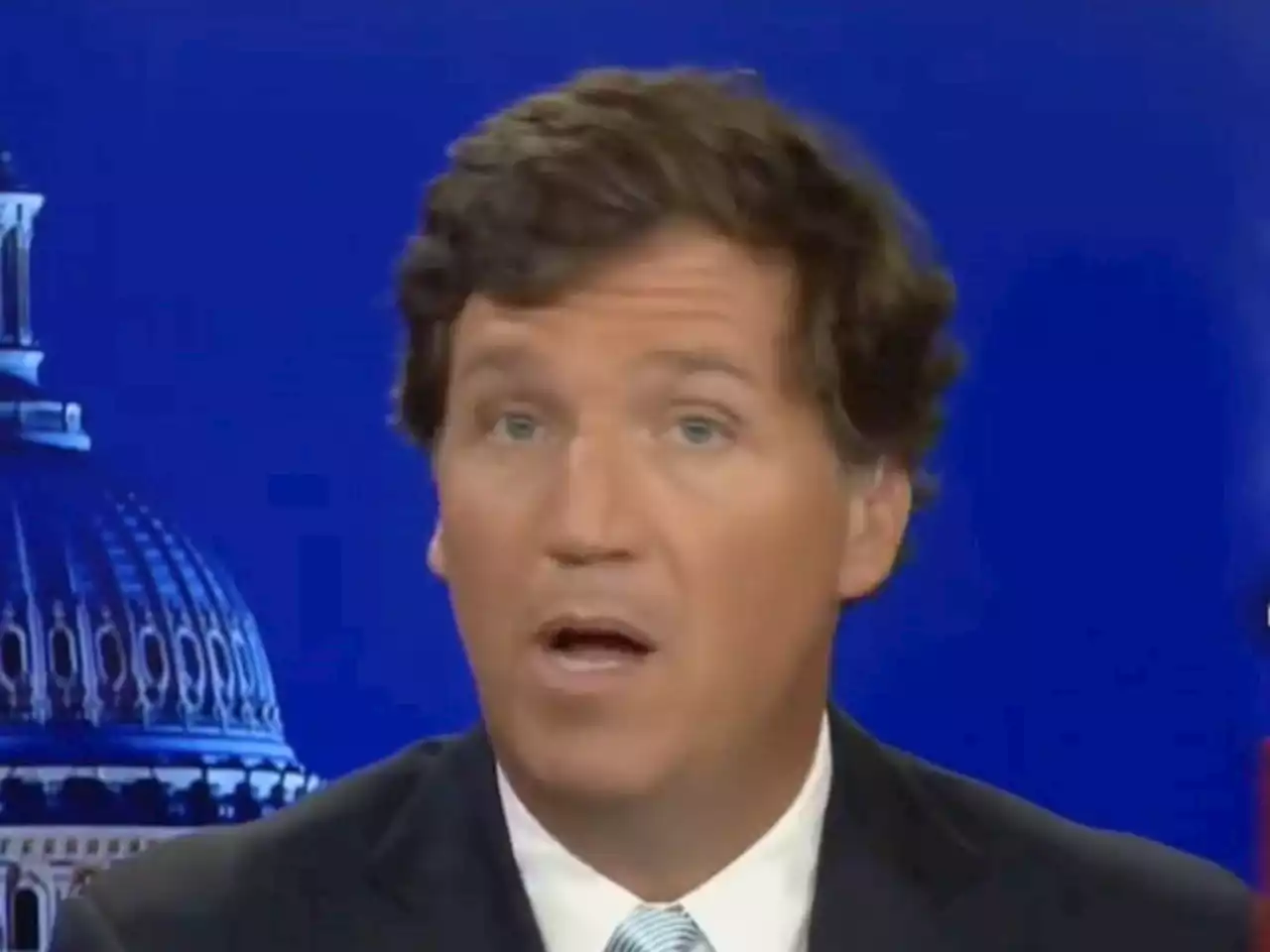 Tucker Carlson downplayed the Capitol riot as DC commemorated its anniversary: 'January 6 barely rates as a footnote'