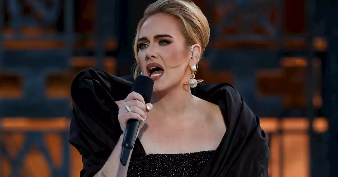 Adele channels Snow White — or maybe the evil queen? — in striking new photo