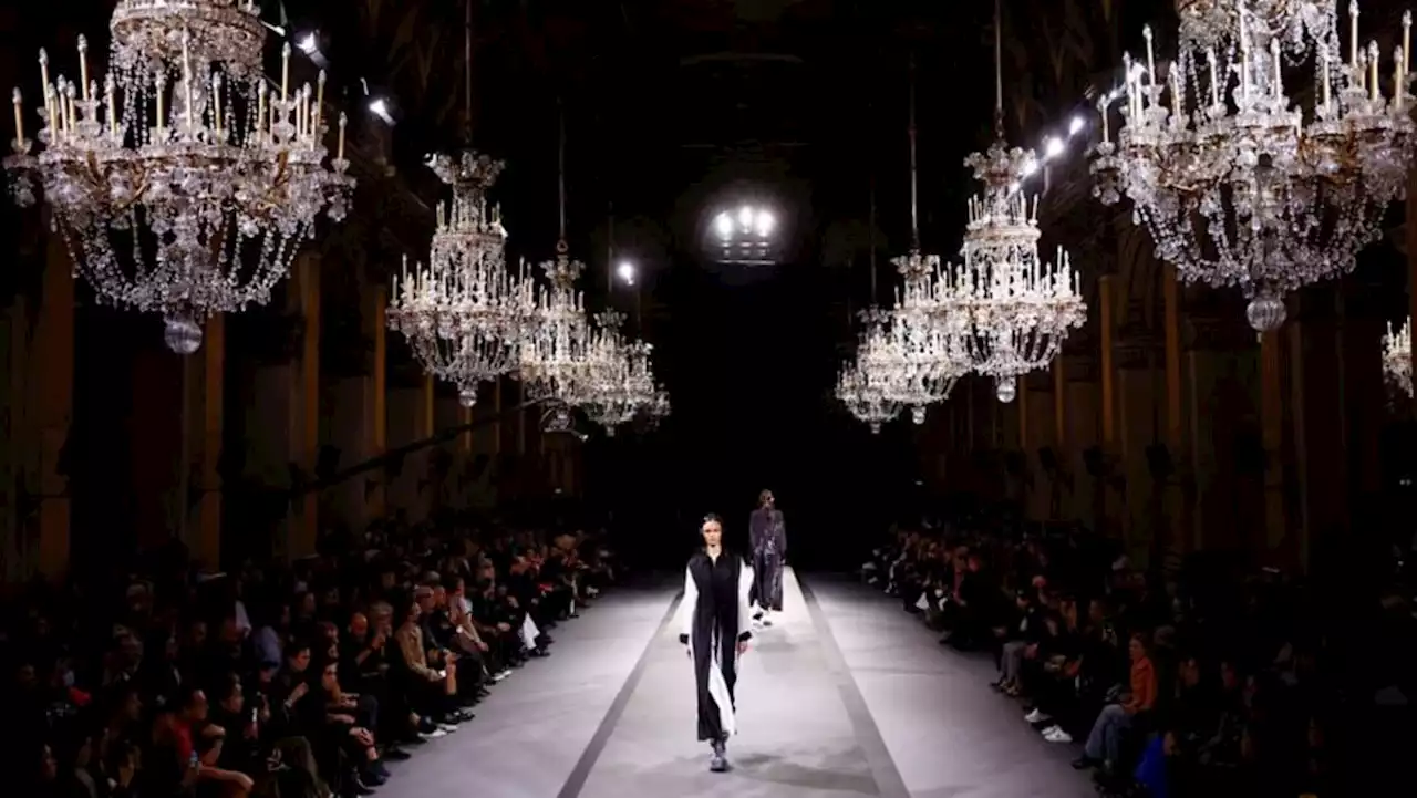 Under a cloud of belt-tightening, Paris Fashion Week struts on