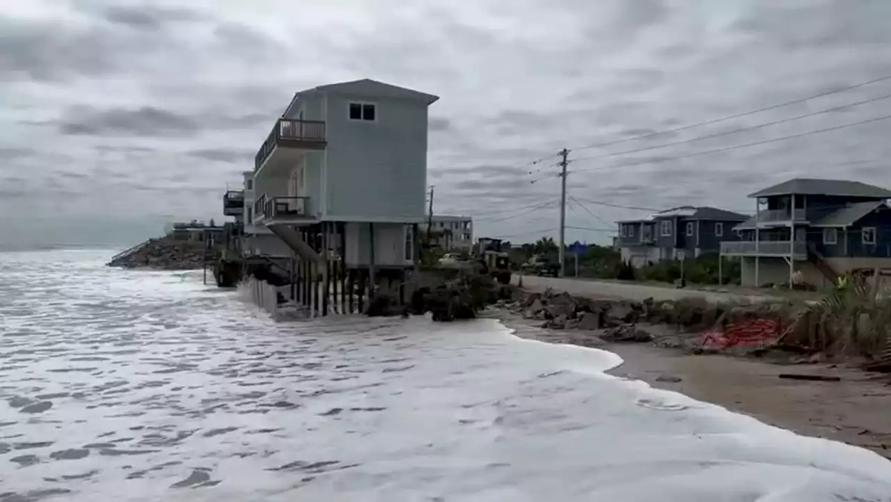 Vilano Beach house in precarious position after Tropical Storm Ian erodes sand, structure